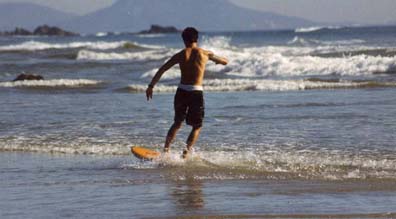 Enlarged photo of skateboarding on the beach